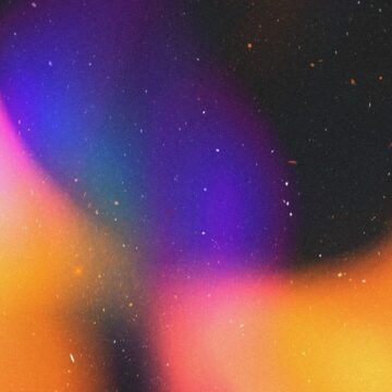 Abstract colorful light leaks with small white dots