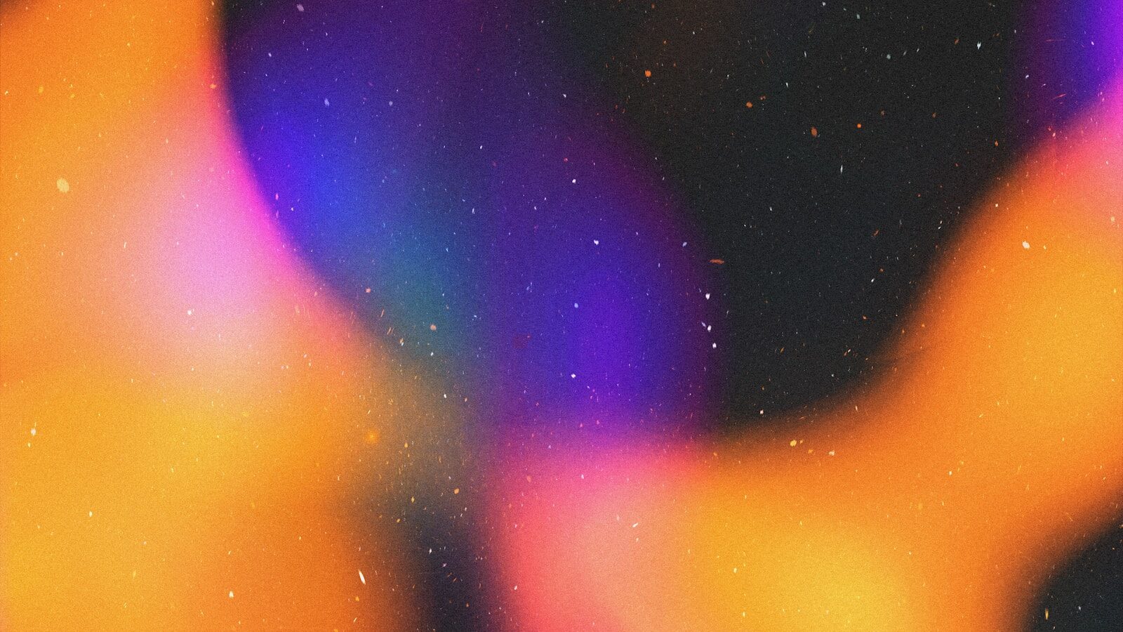 Abstract colorful light leaks with small white dots